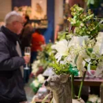 Person shopping around The Bowes Museum shop during festive season