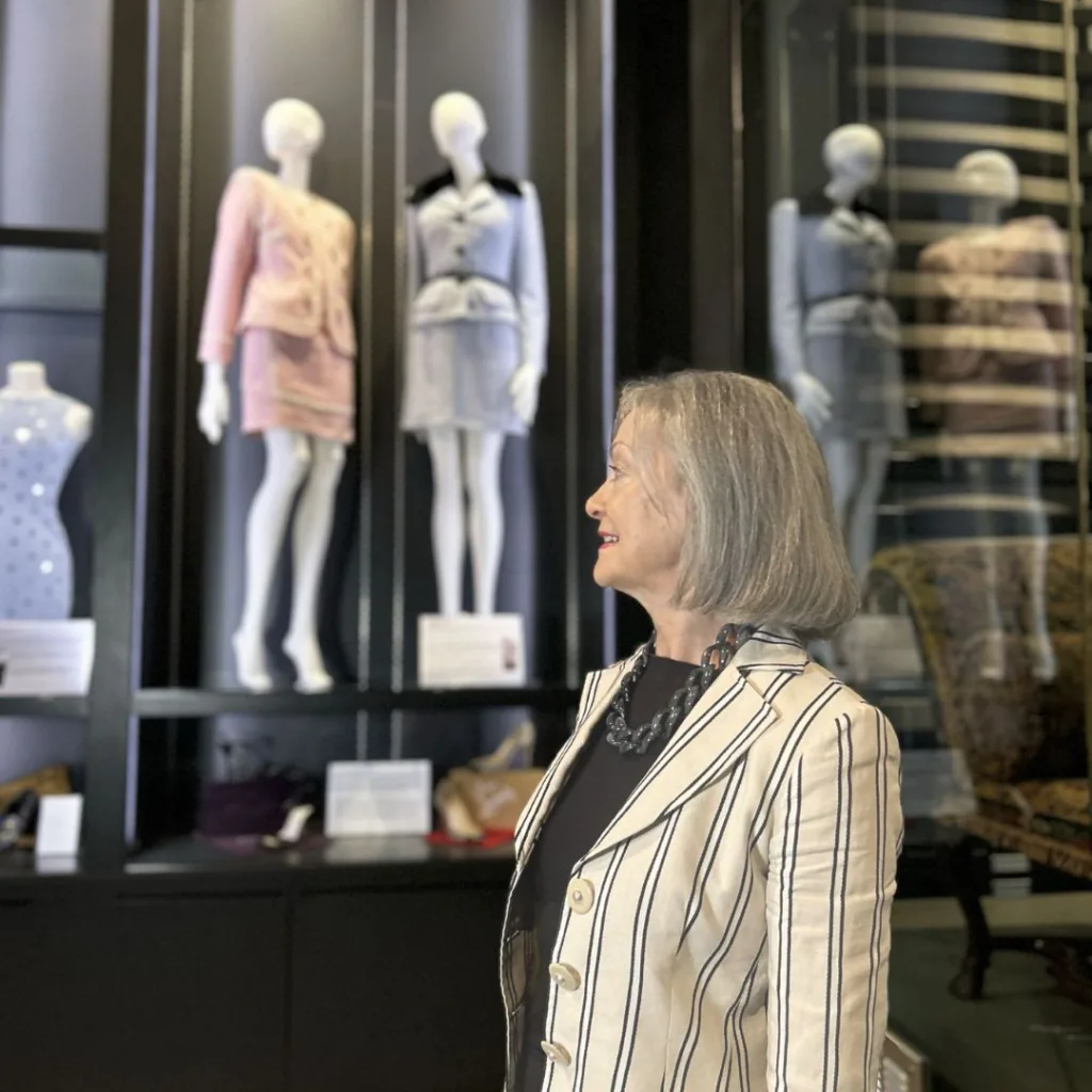 Pamela admiring the display in the Fashion & Textiles Gallery 