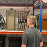 Image of a member of staff in one of the Museum stores