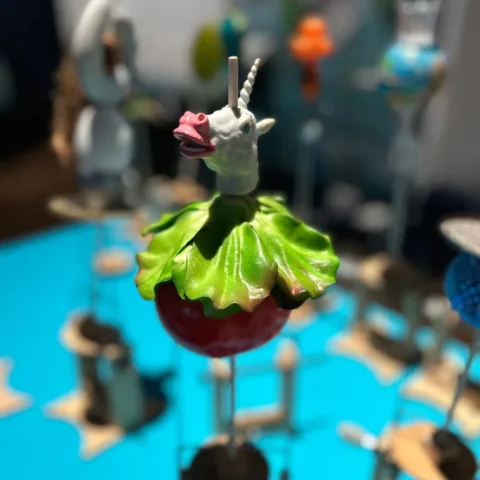 Image of an automaton created in the Cabaret Mechanical Theatre self guided workshop showing a unicorn head, lettuce and a tomato.