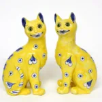 Pair of yellow cats by Emile Gallé