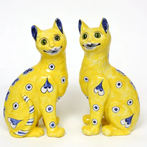 Pair of yellow cats by Emile Gallé