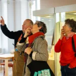 A volunteer giving a tour of The Hive.