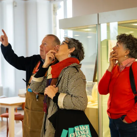 A volunteer giving a tour of The Hive.