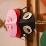 A paper ladybird on an eisel.
