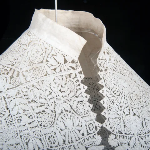 Intricate white lace with floral motifs